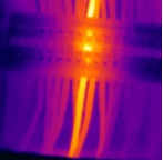Wire was much hotter than other wires - temperature returned to normal after tightening connection Hot wire